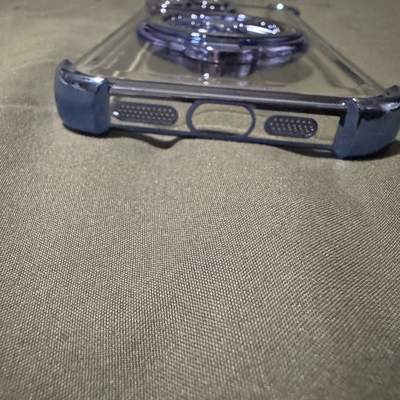 Clear Phone Case with Blue Accents For a 15 Pro Max. Spinning wheel in Center. - Picture 9 of 14